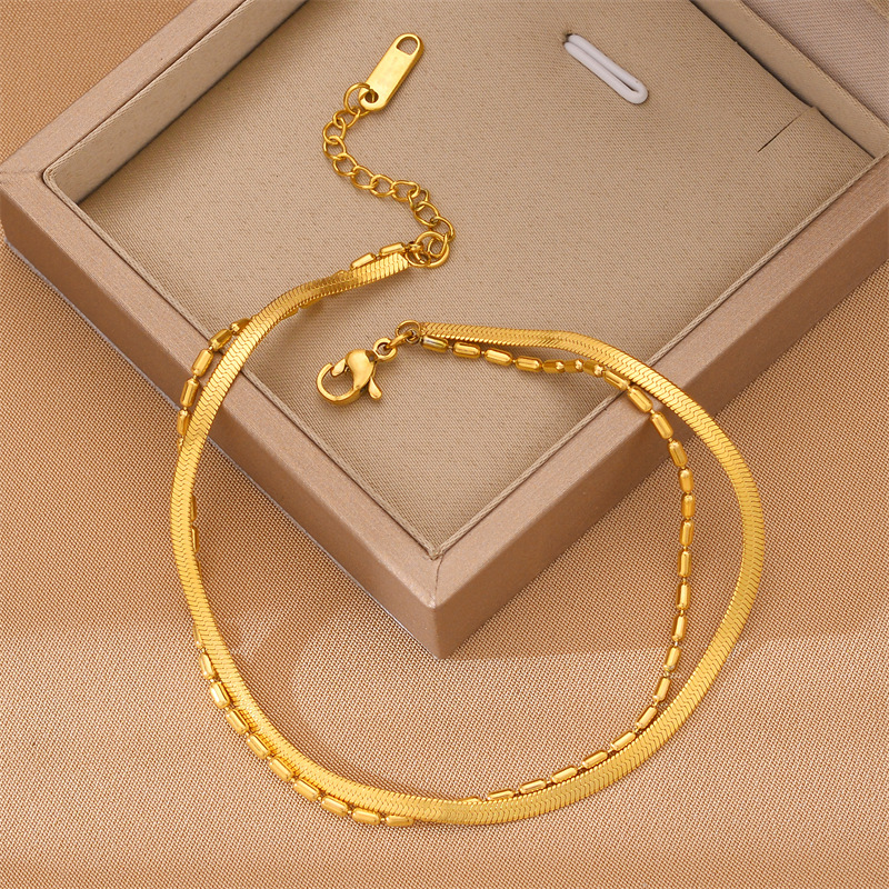 Europa y los Estados Unidos ventas transfronterizas calientes de doble capa de acero de titanio cadena de hueso de serpiente no desvanecer pulsera de alta gama para mujeres joyas de mano