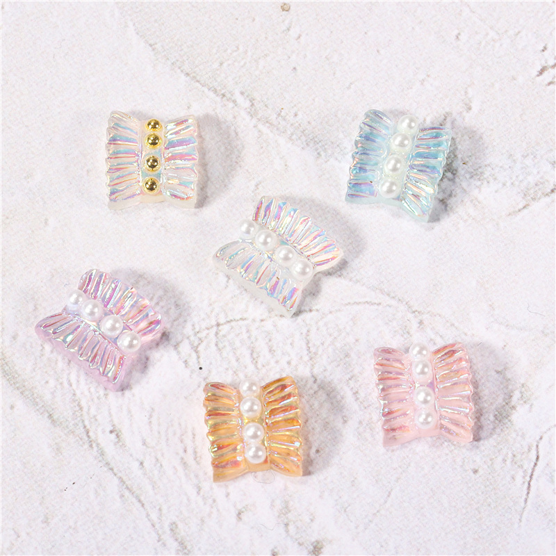 Accesorios de falda de arte de uñas 2021 nueva celebridad de Internet pequeño libro rojo estilo caliente hada aurora falda plisada decoración de uñas