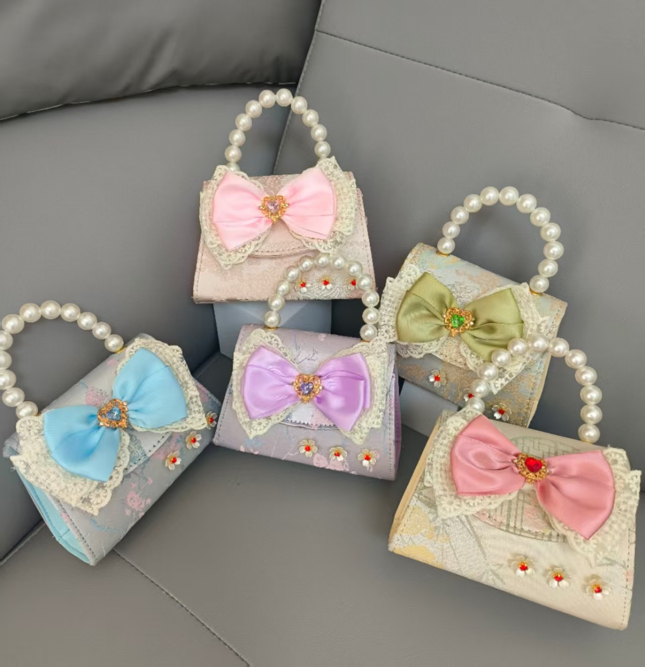 Bolsa portátil de la princesa de perlas estilo nacional arco de hombro bolso de cadena bolso pequeño bolso de cambio de Año Nuevo