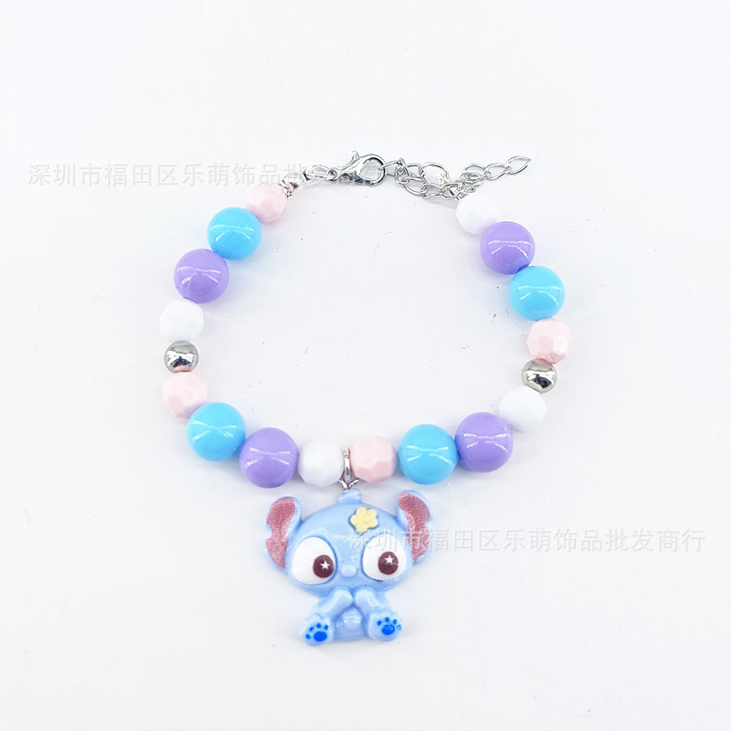 파란색, 분홍색, 보라색의 대비되는 구슬 8개로 구성된 스티치 팔찌