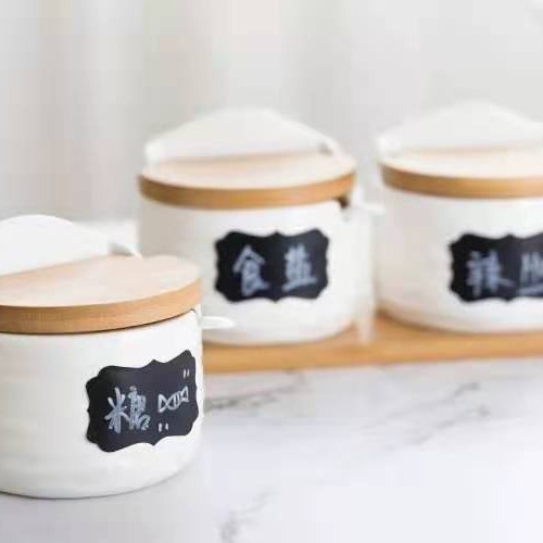 Estilo japonés simple pequeño textura semicircular fresca sensación de mano blanco y negro condimento cuadrado almacenamiento de la cocina especial