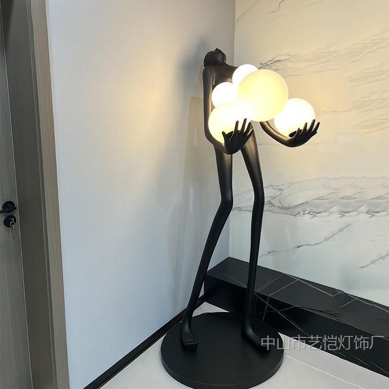 Hotel standing lamp, creative Nordic design, designer showroom, human-shaped ball-holding floor lamp, sculpture figure decoration Hotel standing lamp, creative Nordic design, designer showroom, human-shaped ball-holding floor lamp, sculpture figure decoration