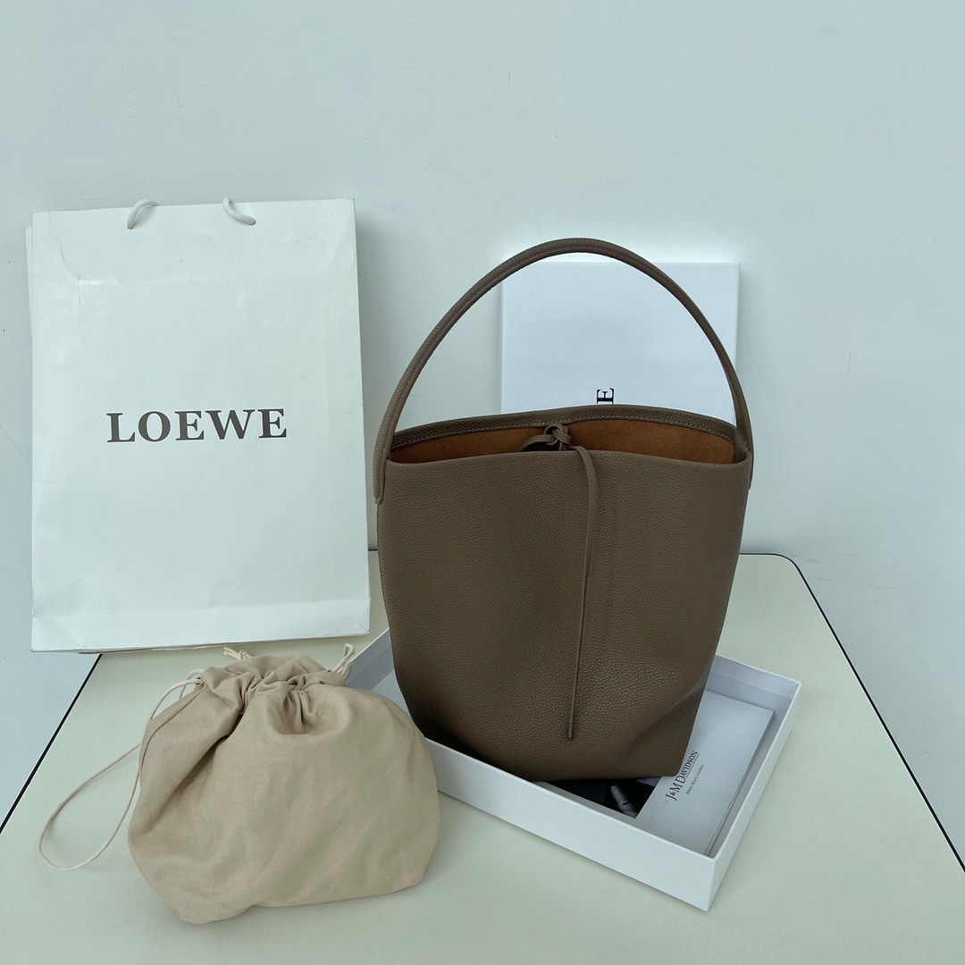 牛革トートバッグ女性のための 2025 新しいシングルショルダー大容量ショッピングバッグカジュアル怠惰なスタイル脇の下バッグ通勤バッグ