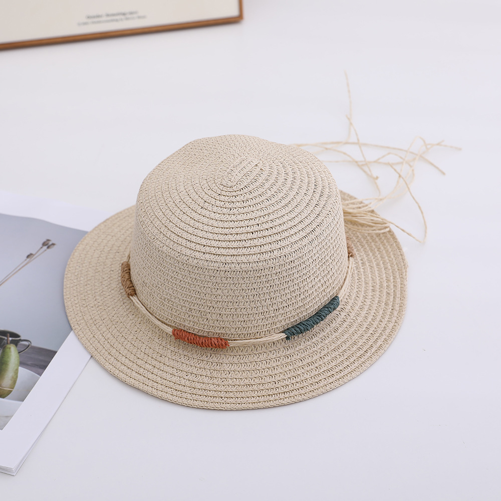 Versión coreana del nuevo sombrero femenino primavera y verano gran ala sombrero para el sol sombrero para el sol de vacaciones protector solar al aire libre sombrero de paja ajustable al por mayor