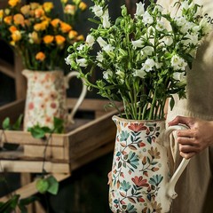 レトロな陶磁器の花瓶の置物の客間の生け花の創意感の田園風の装飾品の芸術の乾いた花の水筒の瓶