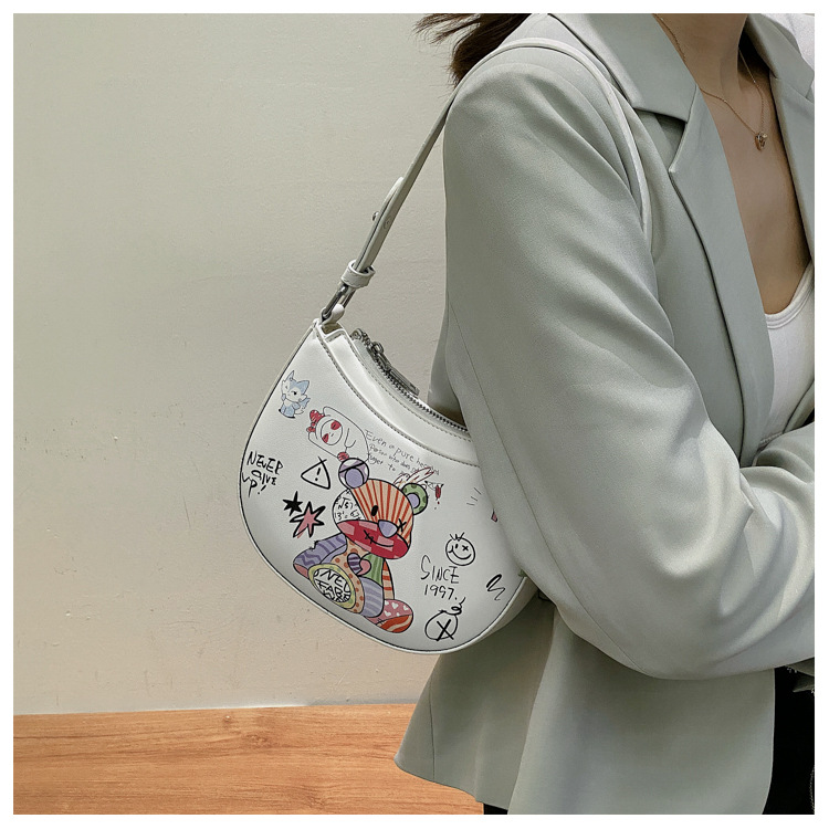 Wholesale Fashion Graffiti Shoulder Underarm Half Moon Bag Nihaojewelry display picture 11