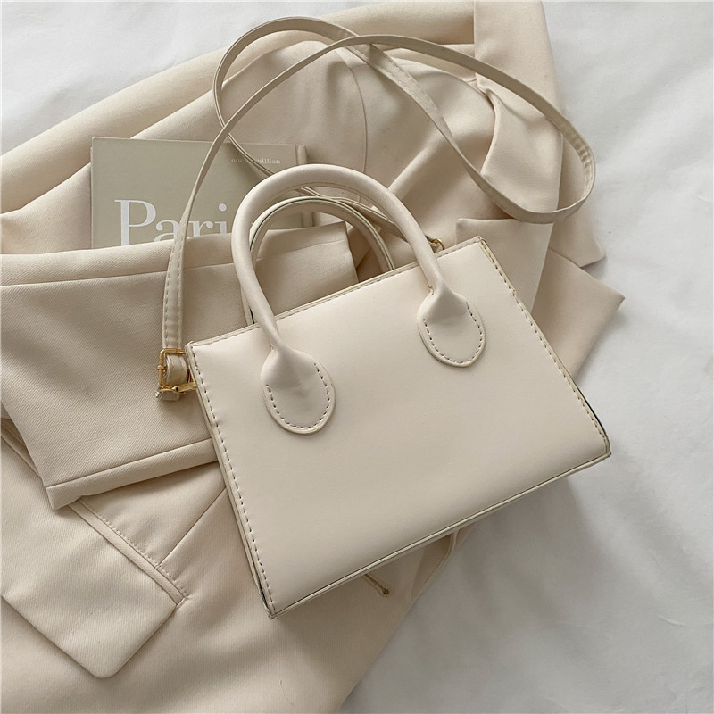 2024 primavera Nueva Bolsa cuadrada pequeña bolsa de estilo coreano de moda de este año de color sólido mini bolso de las mujeres