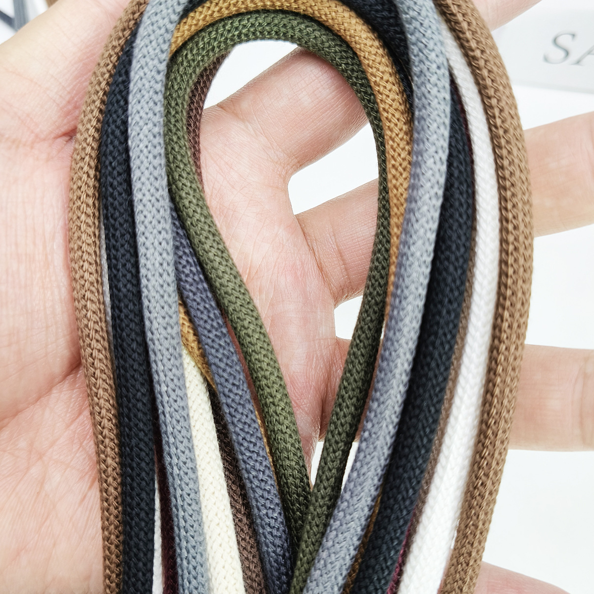 490 colores opcionales 4 / 5 / 6mm poliéster algodón teñido agujas a través de cordones redondos sólidos ganchillo de color sólido cintura cordón gorra cordón