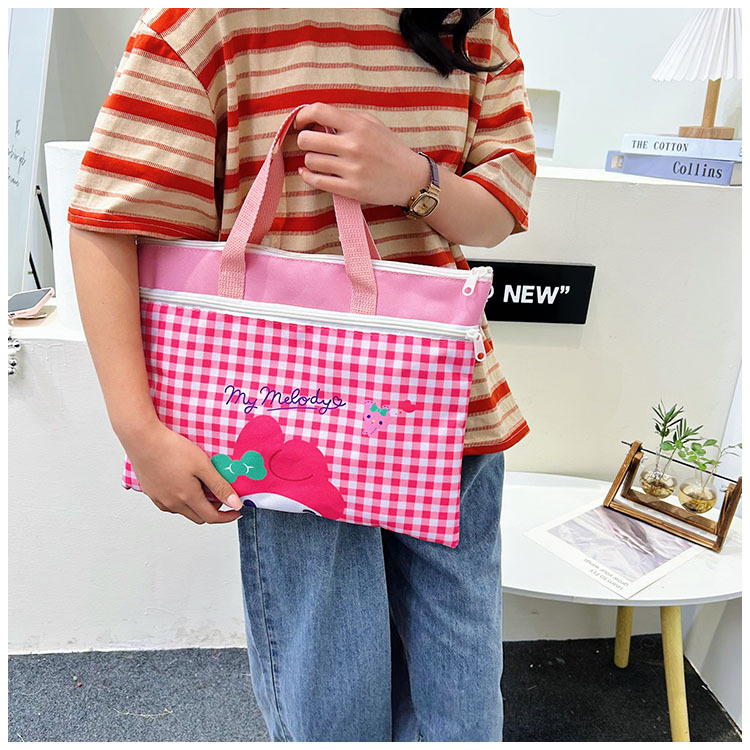 The new Spring 2024 Stardelo minimalist cartoon large-capacity student handbag, study materials and tutorial bag Item Picture