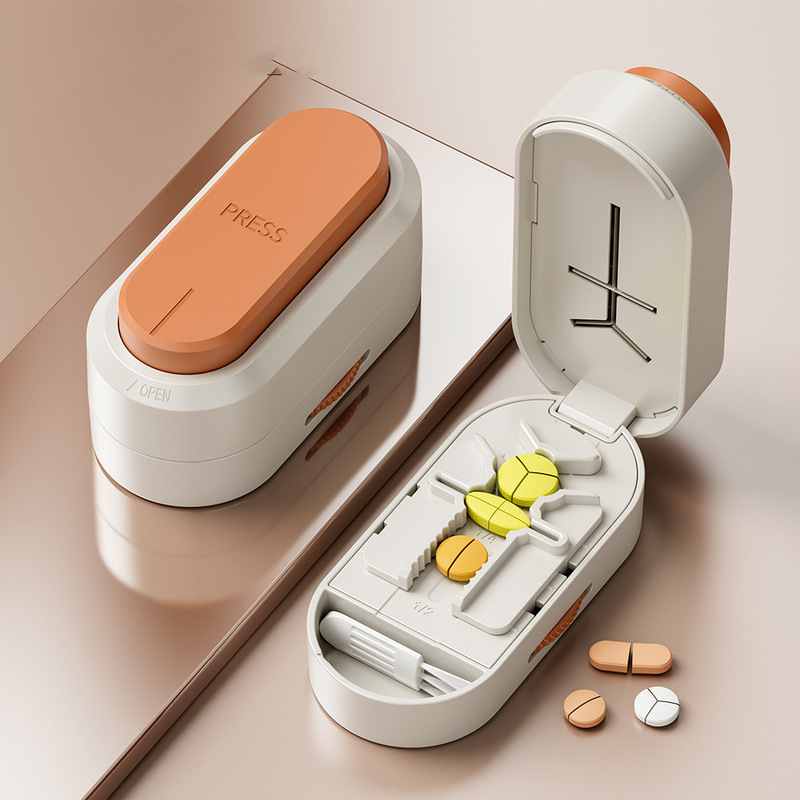 Japanese-style anti-cut design press-type pill splitter and cutter for dividing pills into two, three, or four equal parts Japanese-style anti-cut design press-type pill splitter and cutter for dividing pills into two, three, or four equal parts
