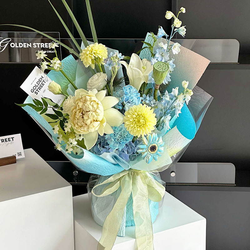 Huaxi Qixi Día de San Valentín Gradiente piedra papel de embalaje de flores arco iris azúcar de alto nivel sensación de ramo de flores papel de embalaje floral