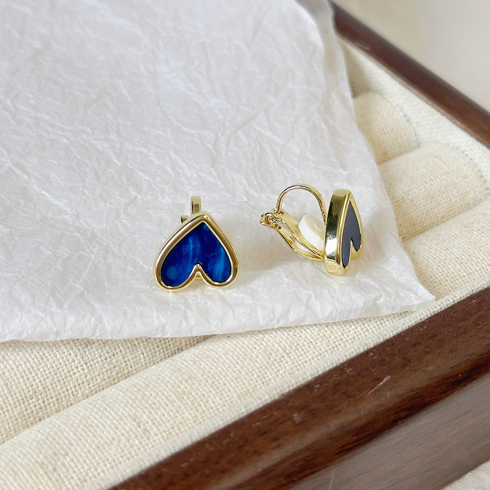 Versión coreana del temperamento de camelia, sin orejas perforadas, pinza para la oreja, flor de perla, tablero de ajedrez, pinza para la oreja triangular con diamantes, pendientes de nicho para mujeres