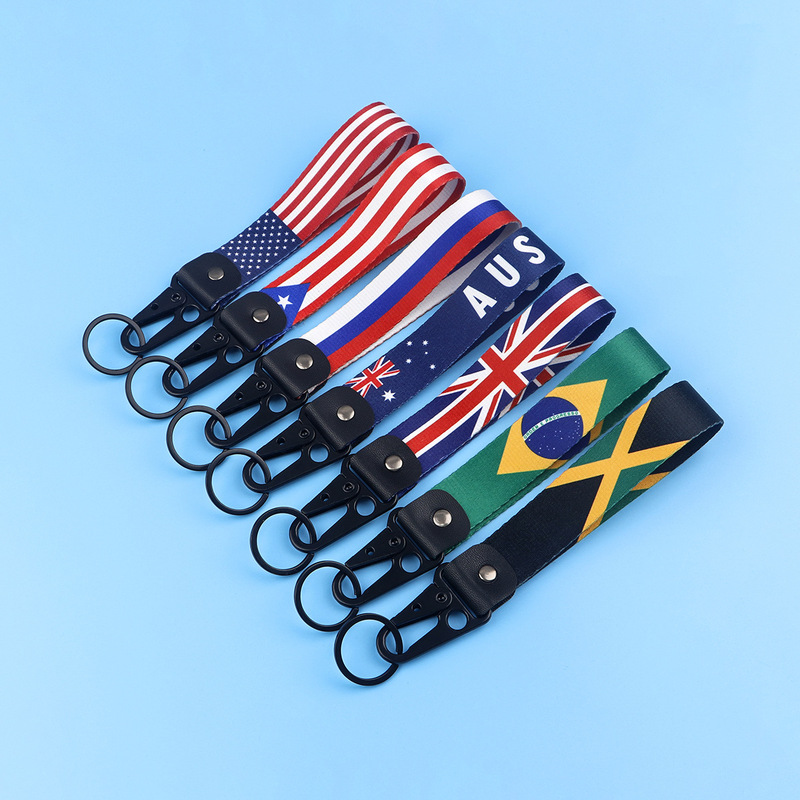 Cross-border Amazon European and American fashion brand simple world flag webbing polyester alloy car keychain pendant
