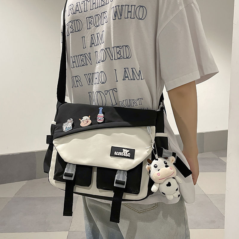 Bolso de hombro de moda para hombres, bolso de hombro para mujeres japonesas de gran capacidad, bolso de estudiantes casuales, bolso de cartero para hombres