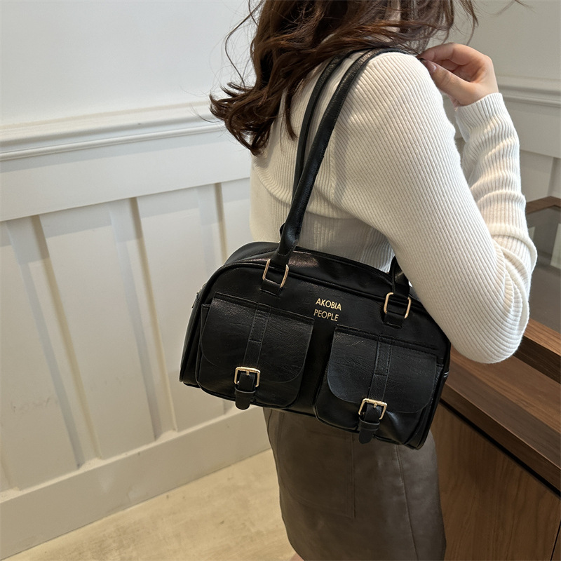 Bolso de bolera portátil de nicho retro para mujer 2024 otoño nuevo bolso de axila coreano de moda bolso de viaje de gran capacidad
