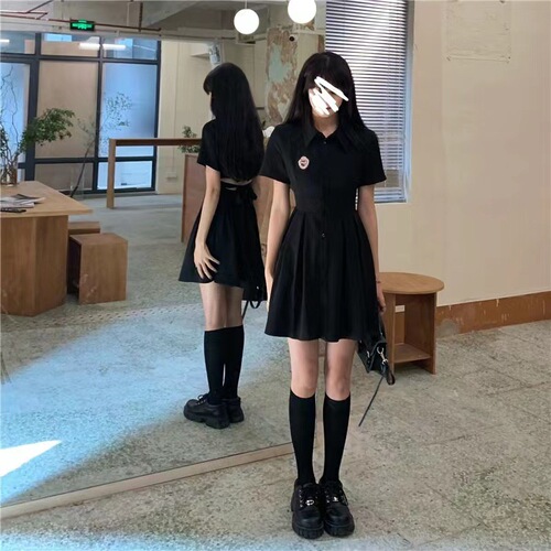 Summer college style French black suit dress with clever waist cinching A-line short skirt