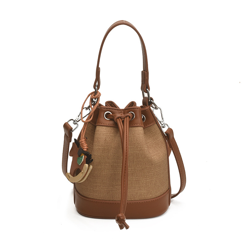 Bolso de cubo de moda transfronteriza 2025 nuevo bolso de hombro de nicho con cordón bolso diagonal bolso de alta gama mujer