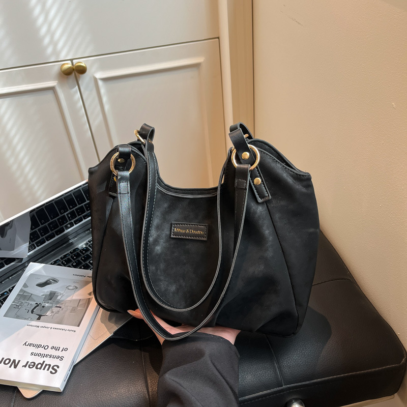 Bolsa de mano de peluche retro de gamuza para mujeres 2025 nueva moda versátil bolso de viaje tote bolso de hombro casual braza