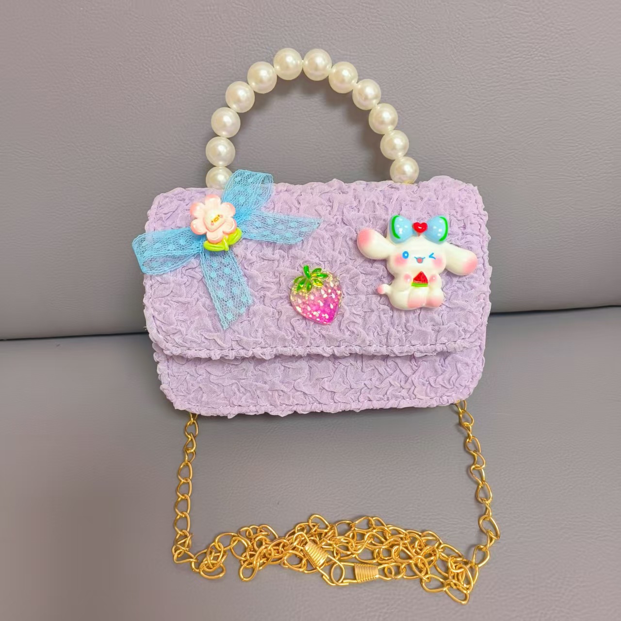 Bow Pearl Princess Handbag Meileti Kulomi Girl Año Nuevo Cartera pequeña bolsa de cadena de viento fragante