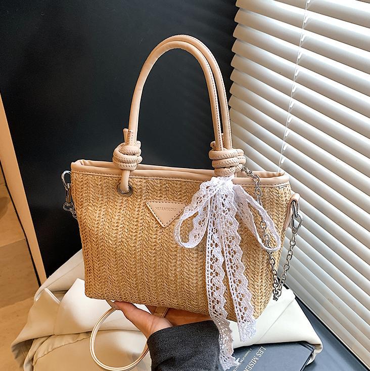 Bolsa de balde de mano de verano explosivo 2025, nueva bolsa de paja de vacaciones en la playa para viajar al trabajo, bolsa de hombro de alta calidad