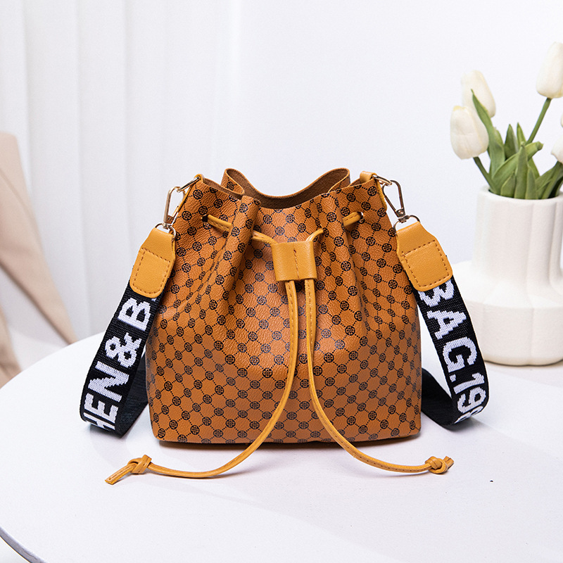 2022 verano nuevo bolso de hombro de moda de mujer bolsa de cubo de flores casuales bolsa de mujer comercio exterior transfronterizo bolsa de mujer bolsa al por mayor