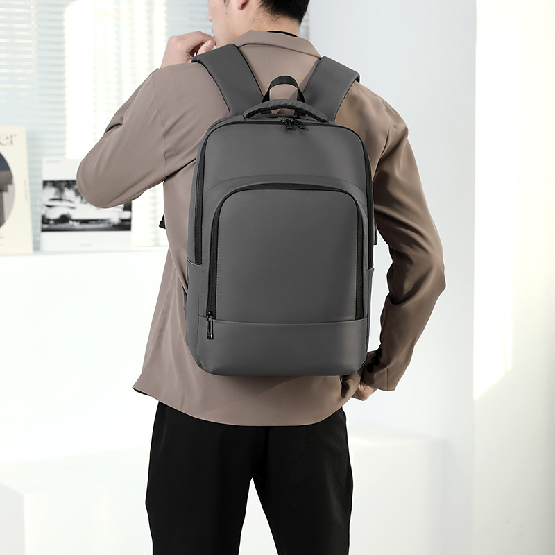 Transfronterizo nuevo estilo coreano moda simple y versátil casual viaje de negocios mochila de viaje bolsa de computadora de gran capacidad