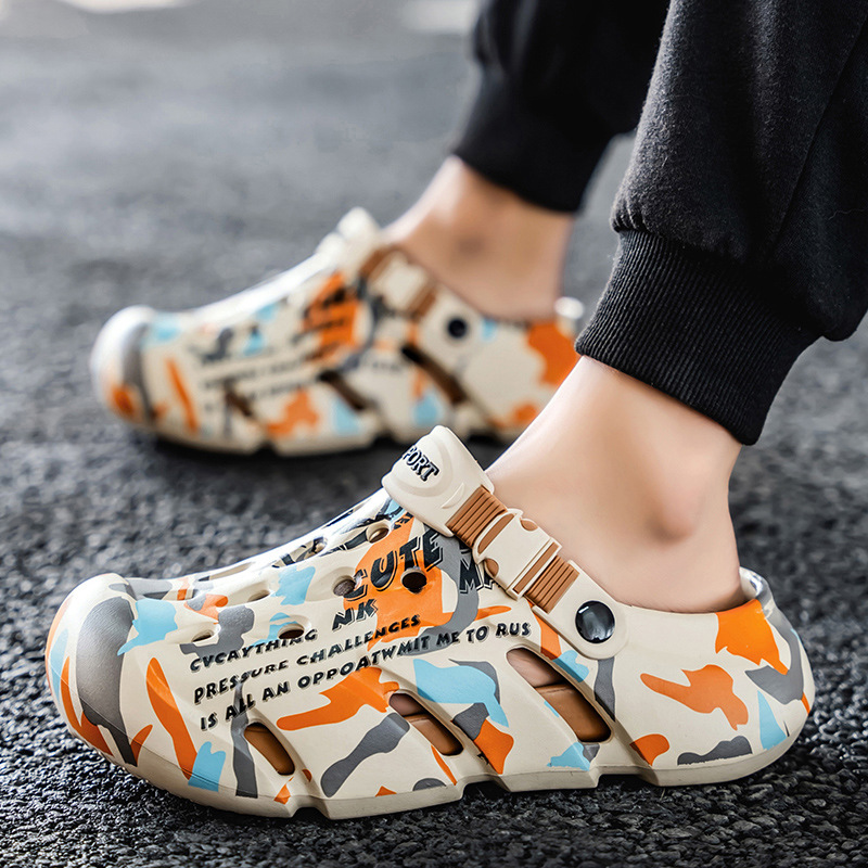 Zapatos con agujeros para hombres nuevo estilo verano al aire libre graffiti Baotou sandalias antideslizantes EVA pisando la mierda sandalias y zapatillas Sandals