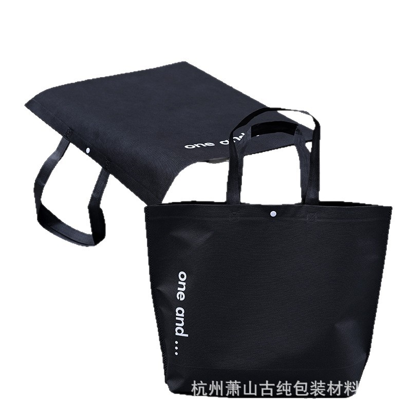 Bolso de mano no tejido de gran capacidad personalizado LOGO engrosado ropa de mujer protección ambiental bolsa de publicidad bolsa de compras de la tienda de ropa