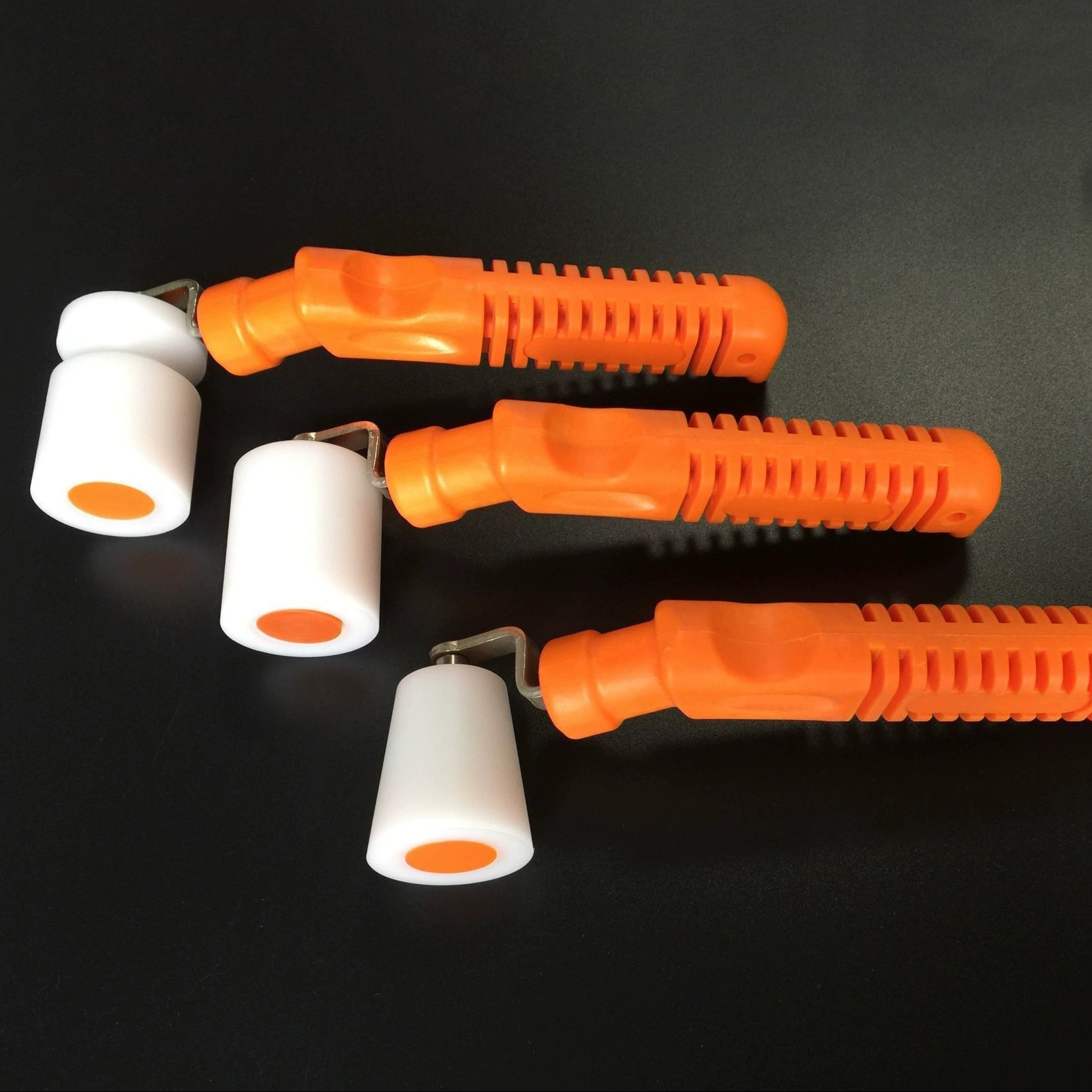 专业优质贴壁纸墙纸工具接缝压轮带防水盖桔色塑料手柄