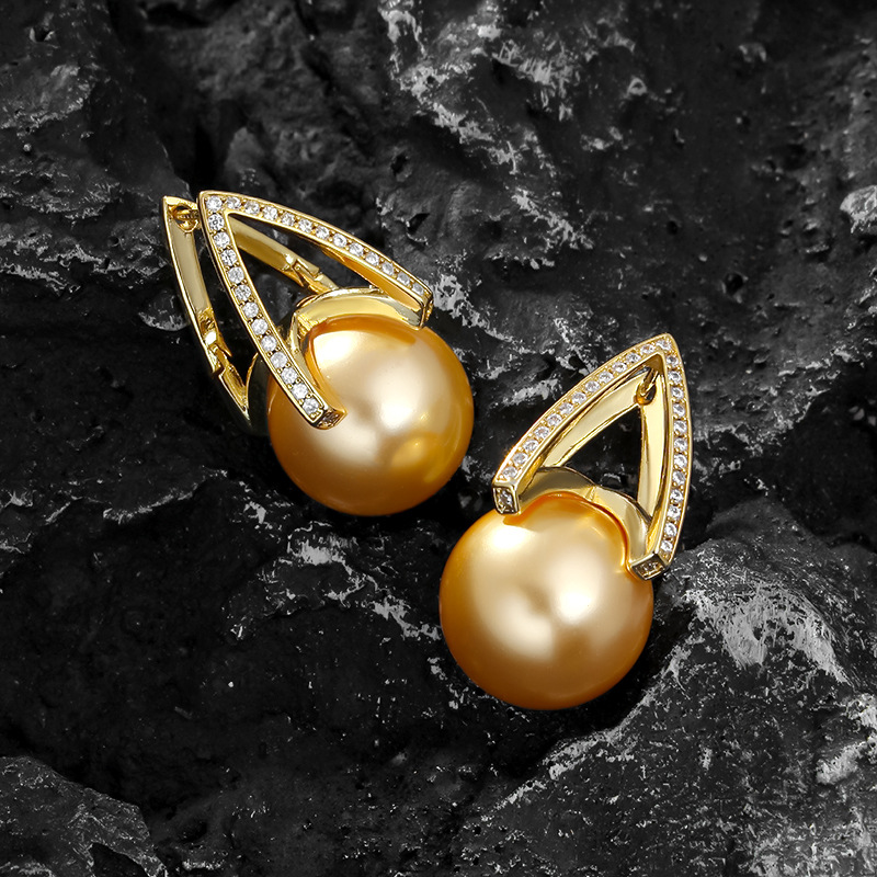 Golden earrings from pearl