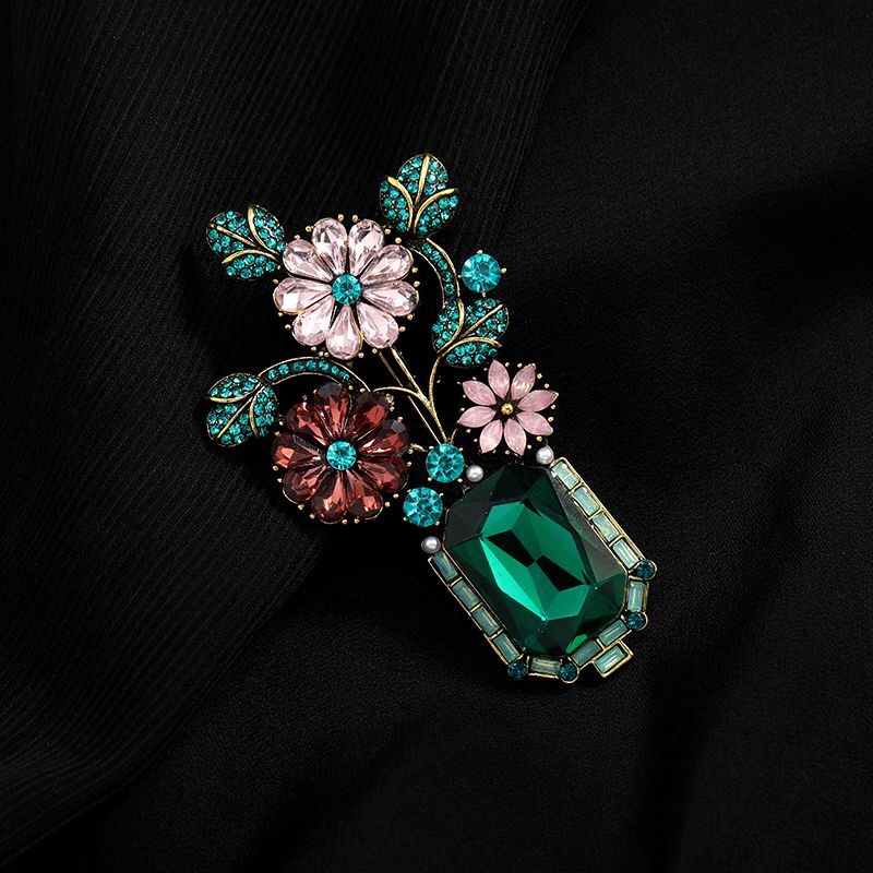 Spilla vintage floreale cristallo verde rame stile corte gioielli_voghion.com
