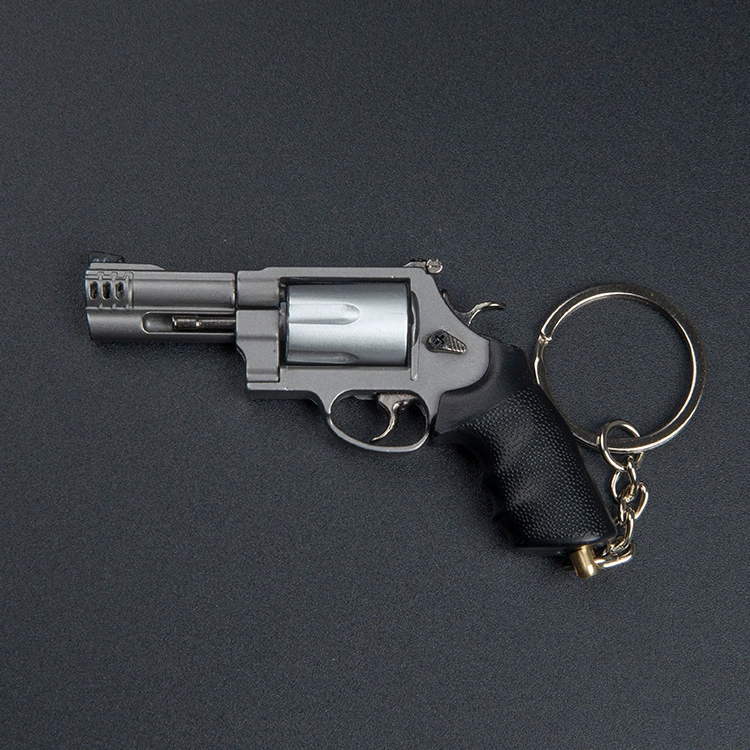 Маленький металлический revolver (пистолет-игрушка), брелок
