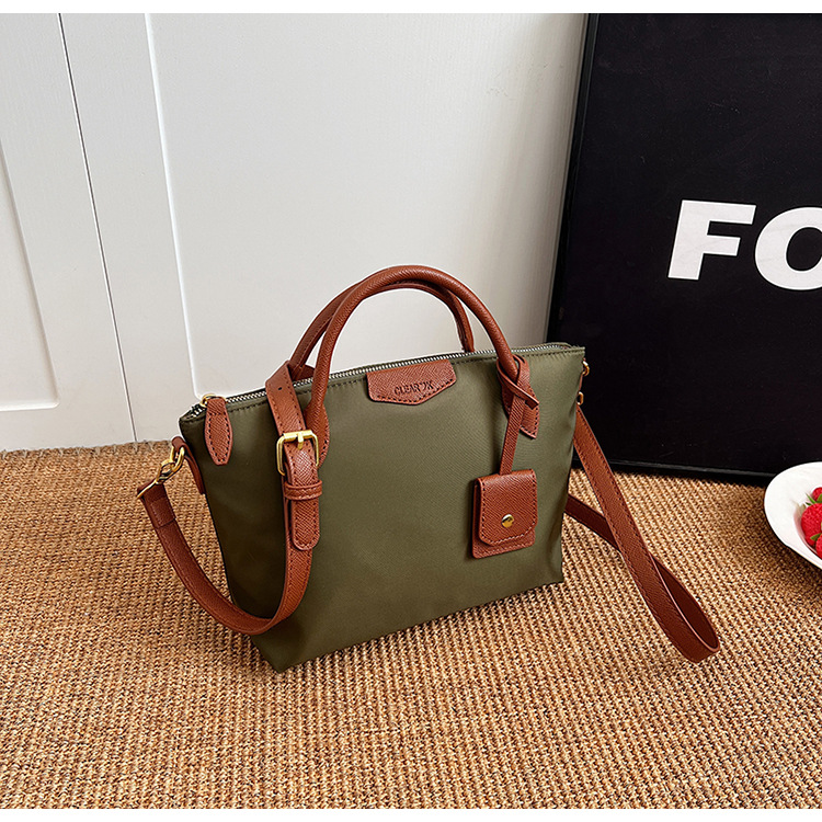 Transfronterizo nueva tela de nylon ligero Portátil Bolsa de mano de las mujeres 2024 primavera popular moda hombro bolsa de mensajero