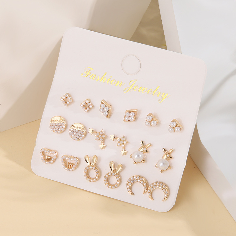 Fashion Sun Star Moon Alloy Inlay Artificial Pearls Rhinestones Women's Ear Studs 1 Set display picture 15