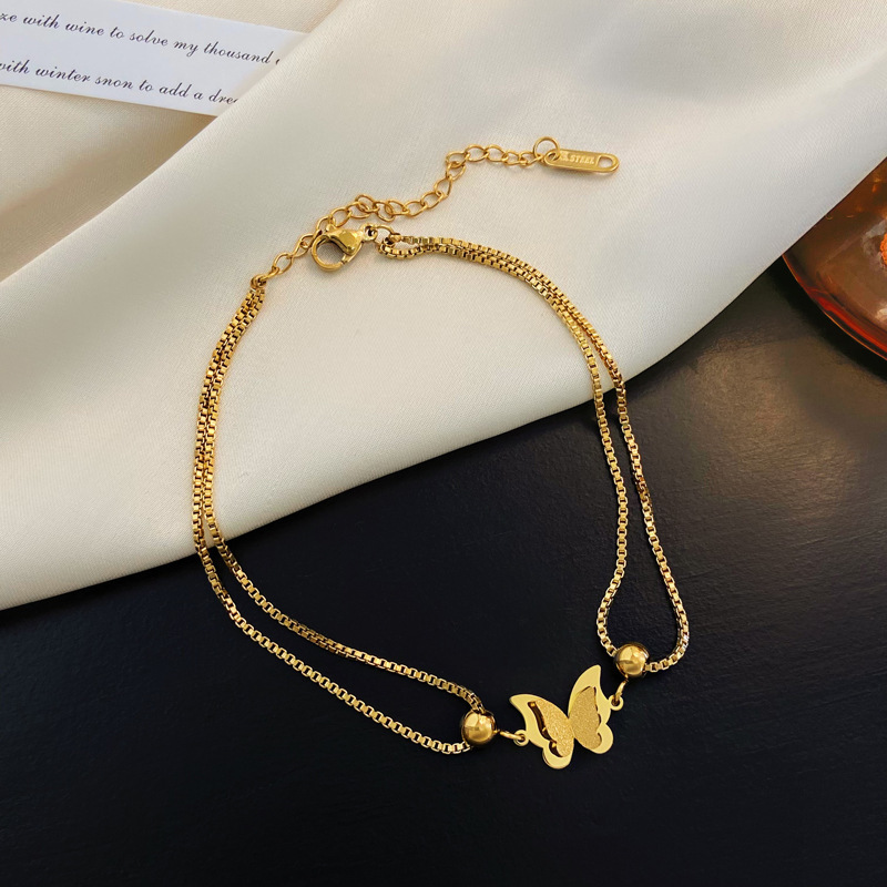 Butterfly Bracelet de alta calidad 18k oro nuevo estilo de cadena de tobillo de acero de titanio no decolor sexy nicho de tobillo para mujeres