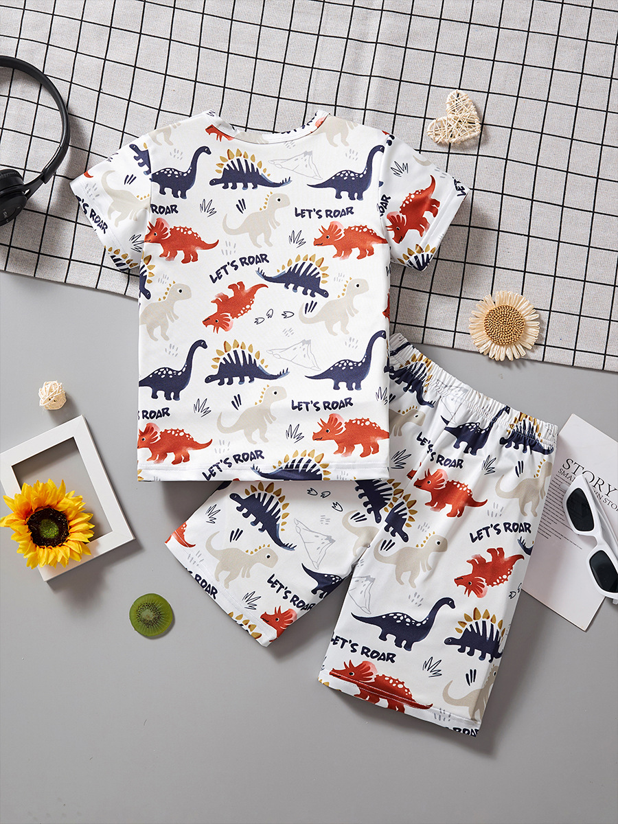 25 años de verano nuevos niños dibujos animados dinosaurios mangas cortas pantalones cortos set de niños tendencia de moda para niños dos piezas set