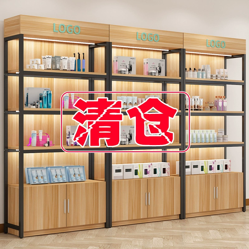 Супермаркет Полки косметических продуктов Витрина показывает образцы канцелярских товаров для матери и ребенка