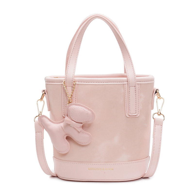 Este año, la popular bolso de mano super caliente para mujeres 2025 nuevo bolso de cubo retro versátil de alto nivel sensación de hombro mochila