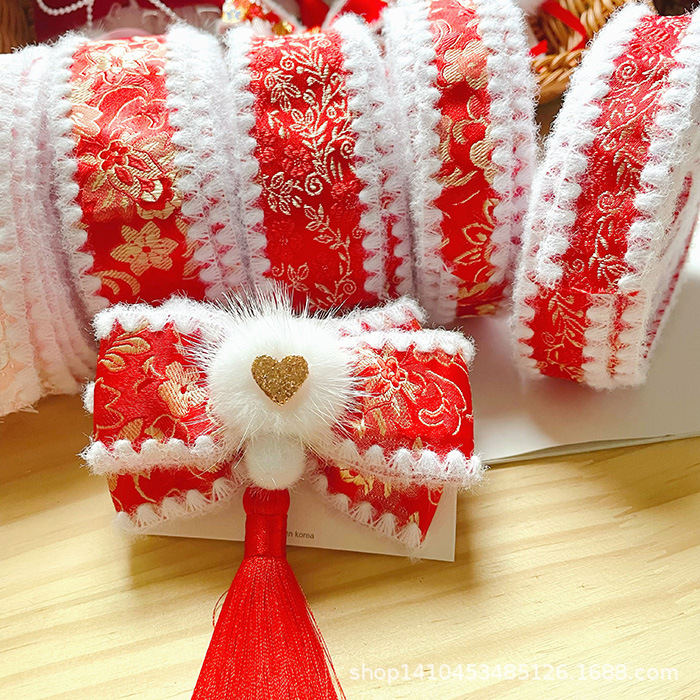 Classic festive red children's hairgrip with bow