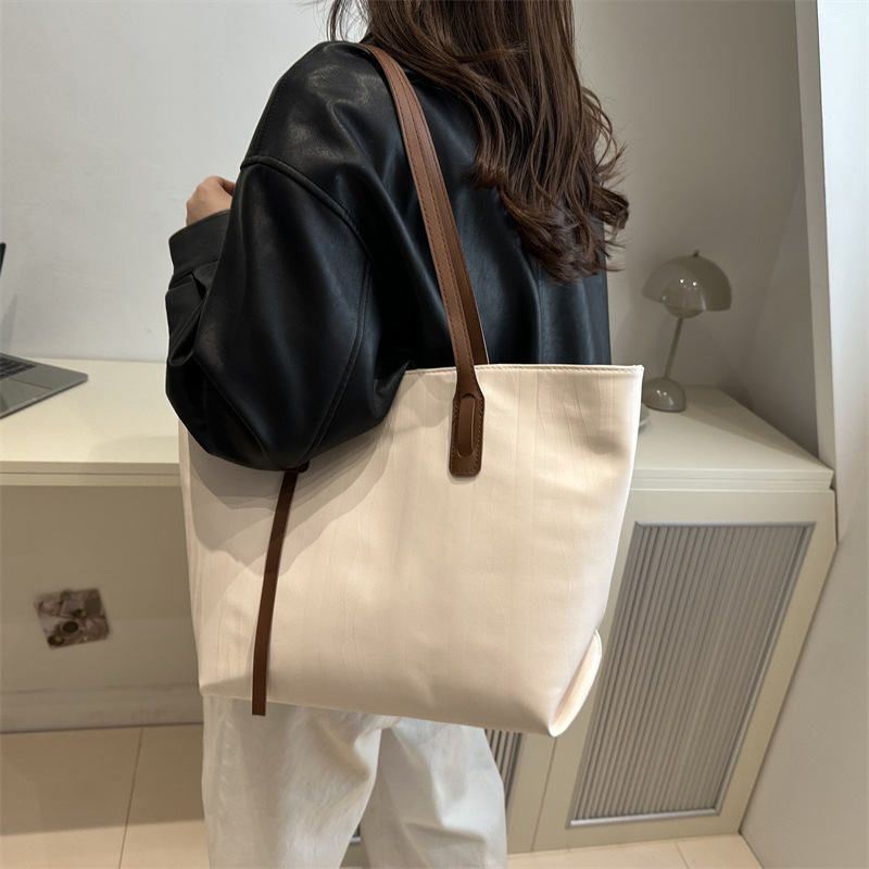 Bolso de gran capacidad para mujeres 2024 nuevo bolso de mano de textura retro bolso de hombro de viaje de mujer bolsa de oficina