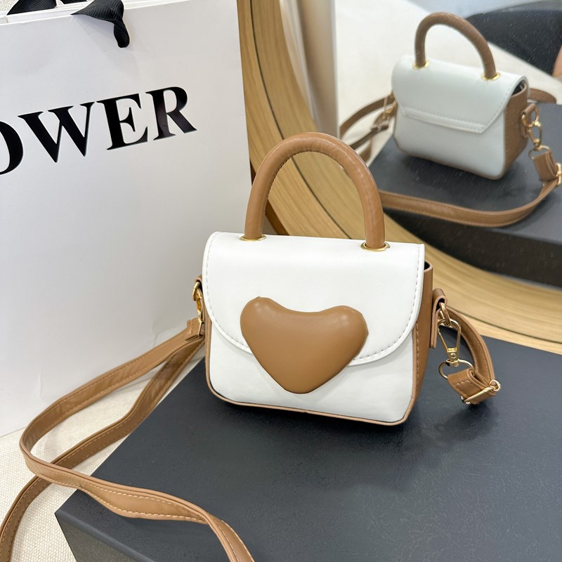 Bolsos para chicas coreanas de dibujos animados de amor contra colores de moda extranjera para niños de un solo hombro bolso de cambio