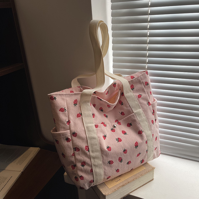 Coreano ins chica impresión de fresas viaje mochila 2025 nueva gran capacidad velcro bolsa de mano casual