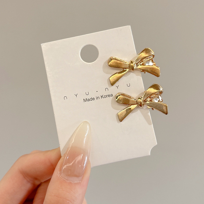 Sweet Cool Metal Hairpin Mujeres 2025 nuevo estilo de alto nivel frente fresa cabello cortado oreja lateral clips adornamiento para el cabello