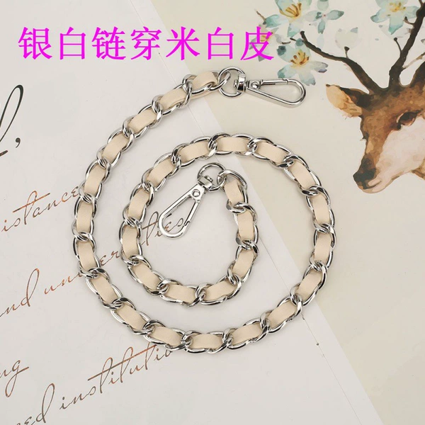 Silver and white chains with beige leather