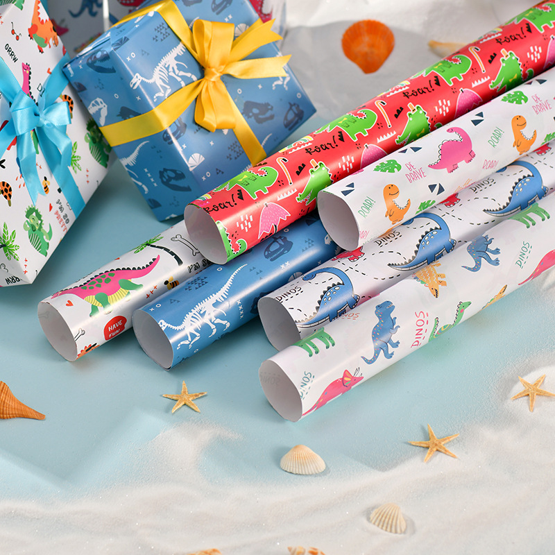Nuevo papel de embalaje de regalos transfronterizos Día de los niños cartón de dibujos animados papel de caja de regalo de cumpleaños lindo papel de embalaje de regalos de dinosaurios animales