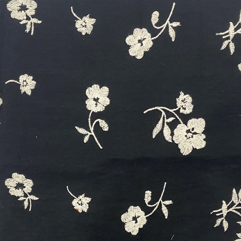 尼龙人棉绣花布 锦粘爱心绣花布 黑底白色双色绣花布料 汉服面料