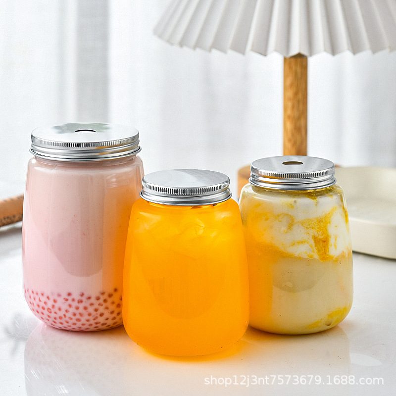 En stock Botella de plástico en forma de U Botella de bebida de jugo de mascota transparente 500ml Botella de té de leche desechable de grado alimenticio al por mayor