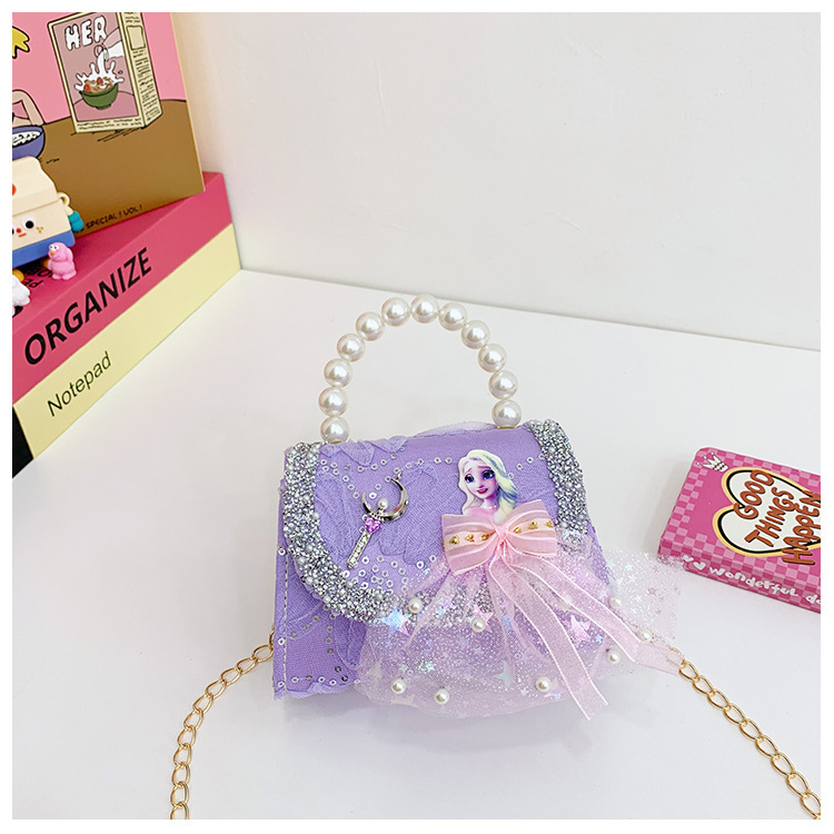 Nuevo bolso de moda para niños bolso de perla animado lindo arco de botón bolso de hombro de niñas cadena diagonal bolso pequeño