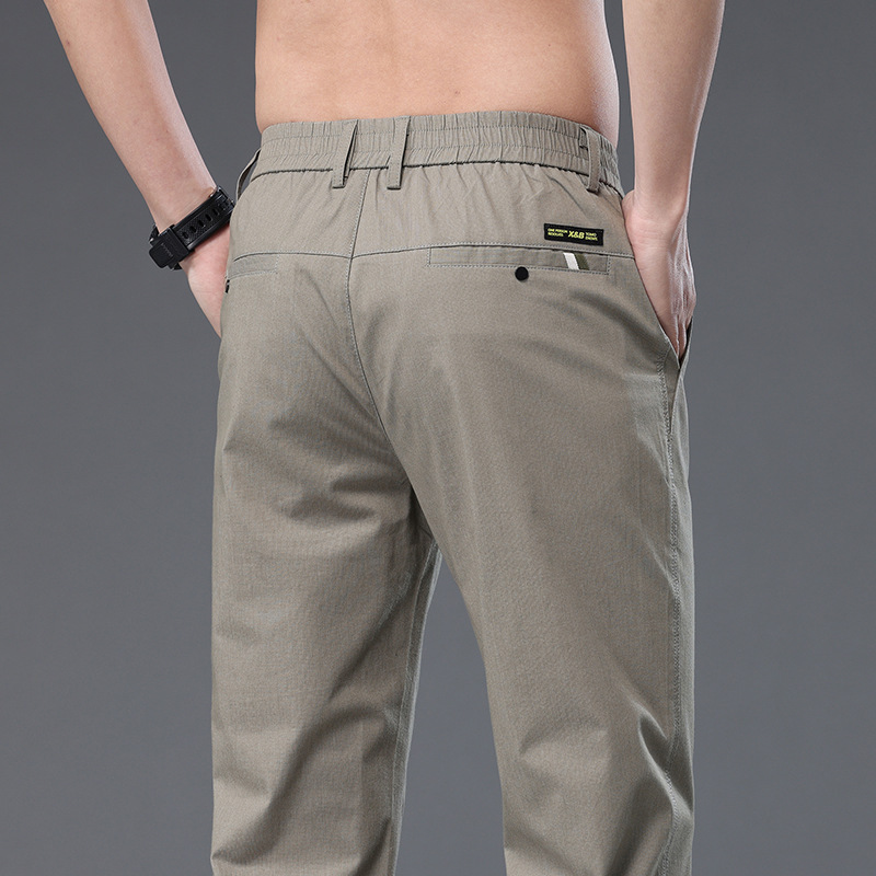 Pantalones casuales de hombre de gama alta primavera/verano 2023 nuevos pantalones de traje casual de negocios verano alto elástico recto sin planchar pantalones de hombre