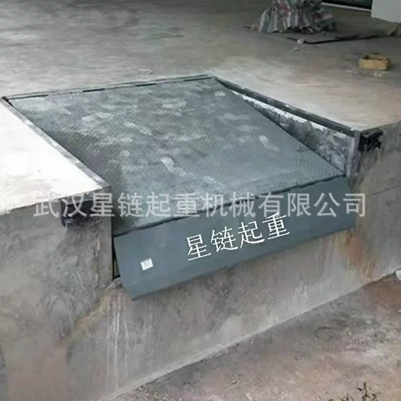 Установка в Ухане: электрическая гидравлическая регулируемая платформа для погрузчиков, фиксированная платформа для погрузки и разгрузки, заводская платформа для подъема и опускания.